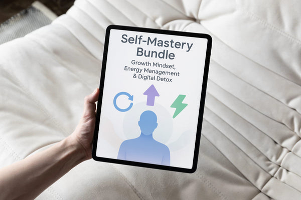 Person holding a tablet with 'Self-Mastery Bundle' on a white cushioned chair